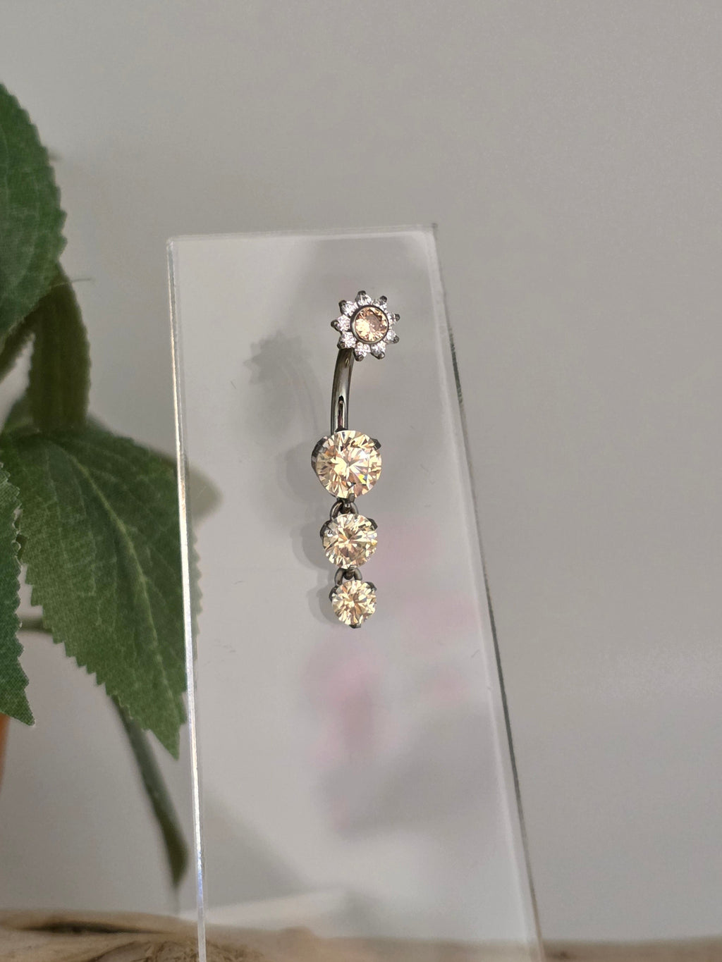 4 Gem Prong Navel Curve with Flower CZ Top