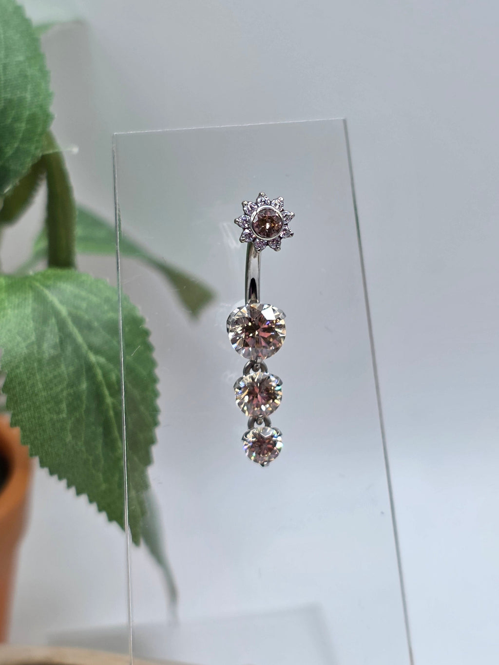 4 Gem Prong Navel Curve with Flower CZ Top